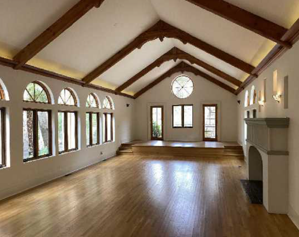 Large room with vaulted ceilings and stunning views