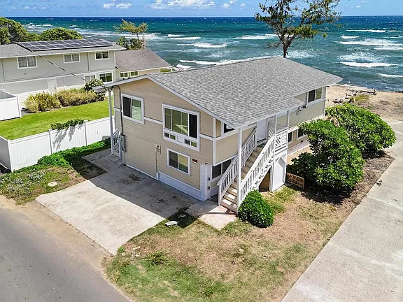 Aerial view of oceanside house in Wailuka, Hawaii